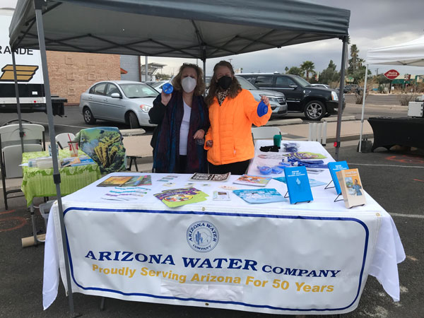 AWC staff promoting SAVE IT! at a booth event.
