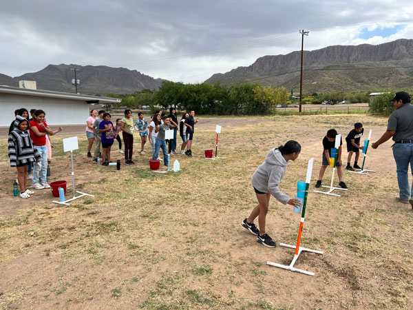 Students engaging in a water learning activity
