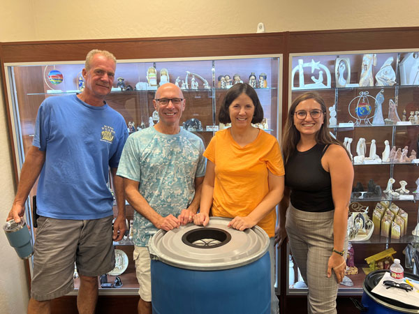 Winners of a free rainwater harvesting barrel at a community workshop five