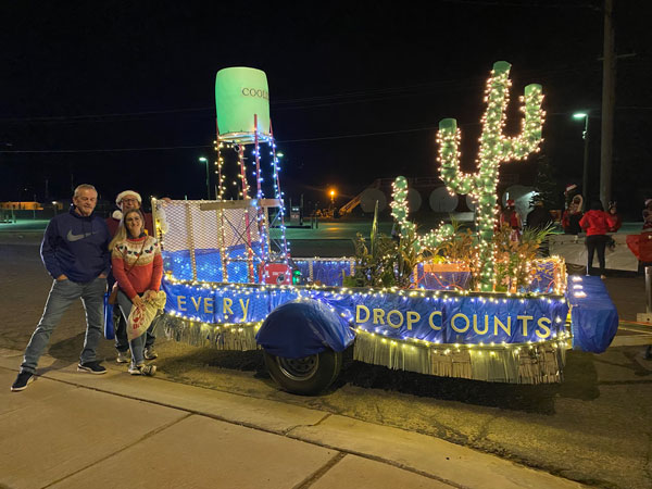 AWC staff with an award-winning float at the Coolidge annual holiday float. one